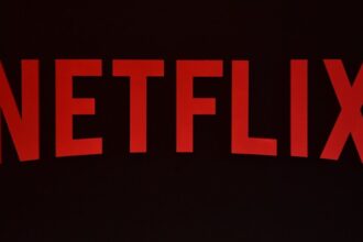 Netflix logo in red on a black background.